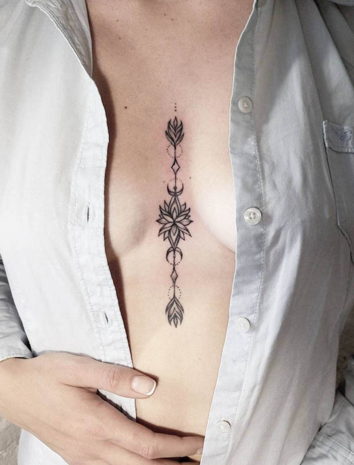 Tattoo uploaded by BowWow art studio • Under breast design tattoo • Tattoodo