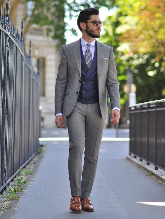 Grey Suit + Navy Self-Printed Waist Coat + White Shirt + Tan Double Monks Shoes